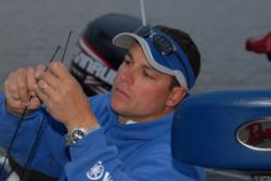 Pro Greg Bohannan readies his rods for day-three action in Mobile.