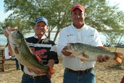 Michael Herron and Gilbert Herald caught these two monster bass from the same tree.