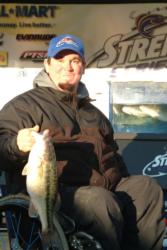 Co-angler Matt Beller of Anderson, Calif., shows off his first-place catch.