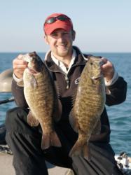 FLW Outdoors Magazine writer Will Brantley hoists a couple of Lake Erie smallies.