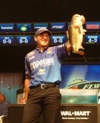Pro leader Brett Hite holds up his 9-pound kicker he caught on day three. 