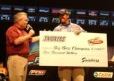 FLW Tour rookie Randy Hadden, the only Florida native in the top 10, accepts his Snickers Big Bass check.