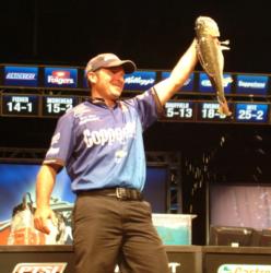 Pro winner Brett Hite holds up his kicker fish from day four on Lake Toho.