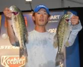 Masahiro Yanase of Nagoya, Japan leads the Co-angler Division of the FLW Tour event on Lewis Smith Lake with a five-bass limit weighing 11 pounds, 12 ounces.