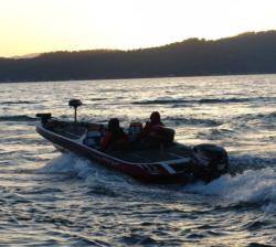 As sunrise starts to glimmer over the hills surrounding Clear Lake, anglers launched into cool, calm conditions.