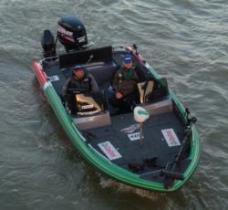 Castrol pro Nick Johnson makes his way to boat check Thursday morning.