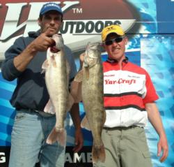 Pro Tom Gatzke and co-angler Jason Copeland hold up their fish from day two.