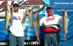 David Kraft and Jason Copeland hold up their day-three catch from Lake Erie.