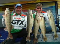 Pro Erik Furseth and co-angler Ike Rhodes hold up their 36-pound, 8-ounce catch. 