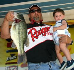 Fourteen-month-old Kaiden Harp, the one on the right, joined his granddad Tim Harp on the weigh-in stage.