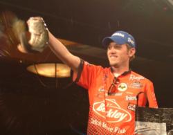 Co-angler champion Stetson Blaylock holds up his kicker bass Saturday.