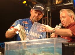 Wal-Mart pro George Cochran is in fifth place with one day of competition remaining.