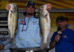 Ryan Rigsby of Hixson, Tenn., is in second place with a limit weighing 19 pounds, 5 ounces. His catch was anchored by a 5-pound, 1-ounce largemouth which took the big bass honors in the Pro Division on day one.