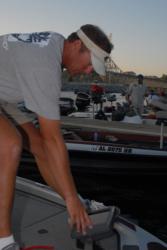 Randy Haynes powers up his Lowrance unit on the front of his boat.