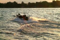 One of the many boats bound for Lake St. Clair on day two of the 2008 Chevy Open puts the throttle down.