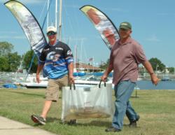 G3 pro Chad Schilling and co-angler Cal Van Cleve bring their fish to the bump tanks.