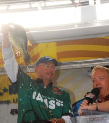 Chip Harrison boated two bonus largemouth bass that pushed his last day limit to 21-6 for the win.