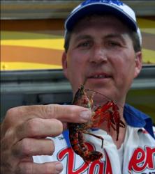 Pro Michael Hall showed the crowd a large crawfish that one of his bass spit up.