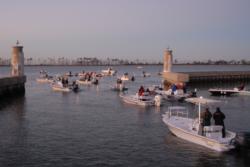 Boats idle out of the break wall in Biloxi, Miss., to kick off the 2008 Redfish Series Championship.