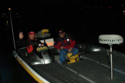 Chris Hanson waved hello to the crew on the FLW pontoon as he checked in on Day 1. 