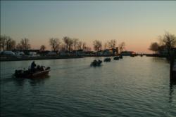 The top 10 pros and co-anglers head for the open waters of Lake Erie at the start of Saturday