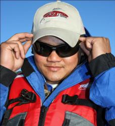 Co-angler leader Vu Au dons his sunglasses in preparation for a day of intense sunshine.