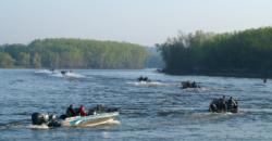FLW Walleye Tour anglers quickly depart to their early-morning honeyholes.