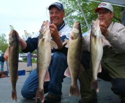 Pro Nick Johnson and co-angler Chad Niemann hold up their 31-pound, 10-ounce limit. Each angler is in second place in their respective divisions.