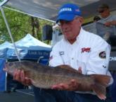 Co-angler leader Larry Oleson holds up a nice Mississippi River walleye.