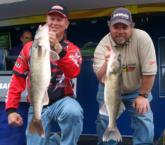 Pro Perry Good and co-angler Mark Grahn hold up part of their day-three catch. 