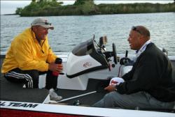 Second place pro Rob Wenning discusses strategy with his co-angler partner Greg Sniffen.