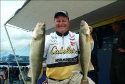 Kevin McQuoid of Isle, Minn. is third with 36 pounds, 10 ounces.