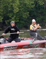 Second-place pro Dave Lefebre hoists a keeper smallmouth Friday morning.