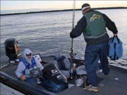 A pro picks up his co-angler on the way to boat check.