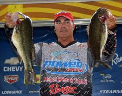 In second place, Tim Reneau caught his fish by flipping a jig in grass.