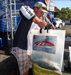 It took a good heave for Randy Mcabee Jr to lift his tournament leading fish.