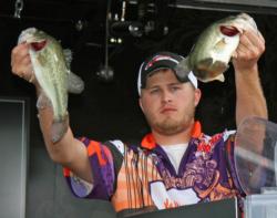 Aaron Sistrunk shows off two of the fish that put Northwestern State in the top five at the 2009 Texas Regional.