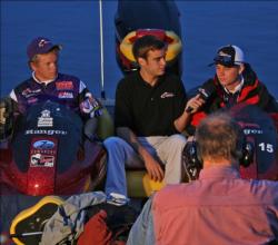 Starting the day in third place, the Young Harris team of Brad Rutherford and Clint McNeal conduct an interview with FLW College Fishing host Chris Cain.
