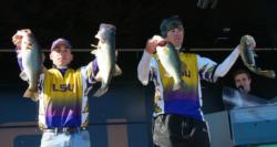 LSU teammates Blake Carrier and Logan Mount show off four nice Falcon Lake bass. 