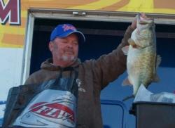 Co-angler champion Steve Hope holds up one of his five bass from day three on Falcon Lake.