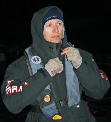 National Guard pro Brent Ehrler zips up in preparation for a chilly morning on Shasta Lake.