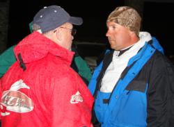 Pro Stephen Johnston talks with American Fishing Series Tournament Director Ron Lappin before takeoff.