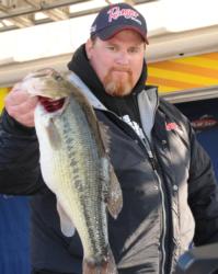 Co-angler Shane Melton of Greentown, Ind., shows off the 6-2 kicker that sealed his Co-angler Division win on Table Rock.