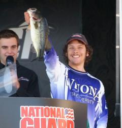 Winona State angler Zac Cassill holds up a nice Bull Shoals largemouth.