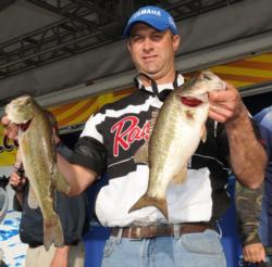 Chris Hults of Vancleave, Miss., shows off his catch on Lake Eufaula. 