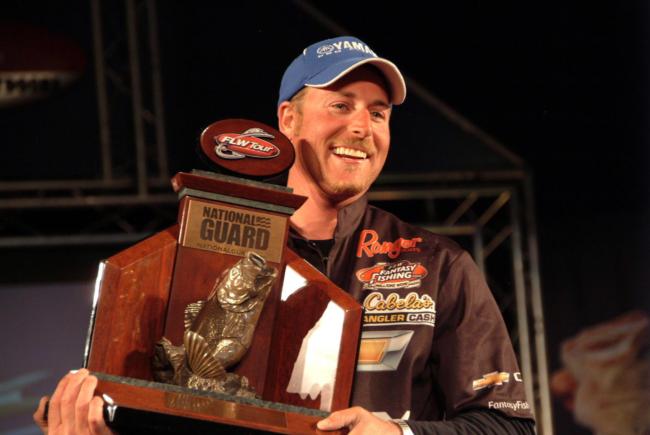 Bryan Thrift of Shelby, N.C., proudly displays his first-place trophy after winning the FLW Tour event on Lake Norman.