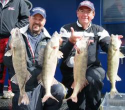 Dean Arnoldussen and Randal Sterr hold up part of their 34-pound, 14-ounce catch.