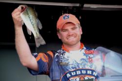 Auburn University team member Shaye Baker shows off his catch en route to a first-place finish.