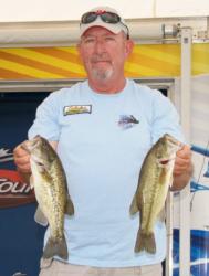 After catching limits on consecutive days, Darrell Mitchell leads the Co-angler Division with a total weight of 18 pounds, 10 ounces.