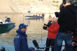 National Guard pro Brent Ehrler conducts one final interview before day-four takeoff on Lake Mead.
